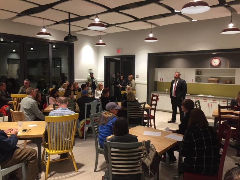 Principal talking to parents school orientation