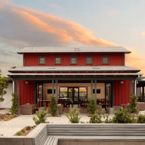 The Hilltop Club clubhouse at sunset